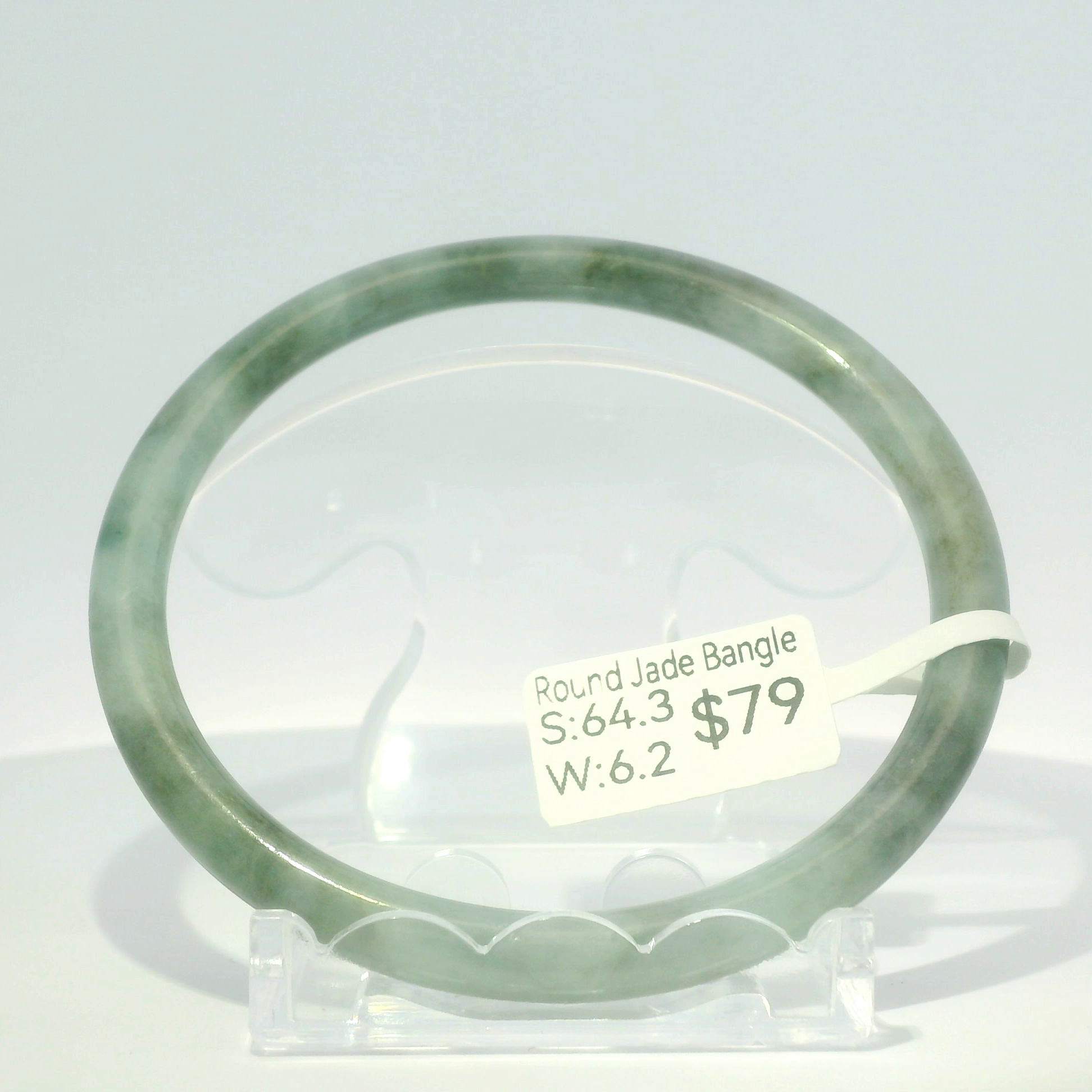 Natural Burmese jadeite bangle in two-tone vintage and imperial green, 64.3mm inner diameter