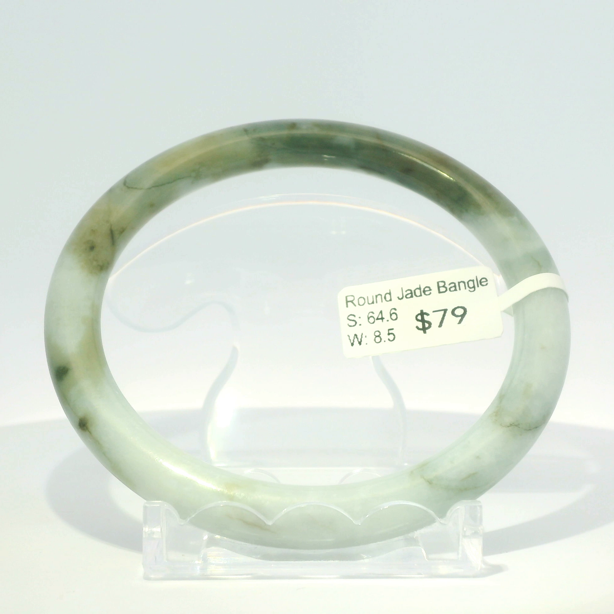 Natural Burmese jadeite bangle in white apple and banana-leaf green, 64.6mm inner diameter