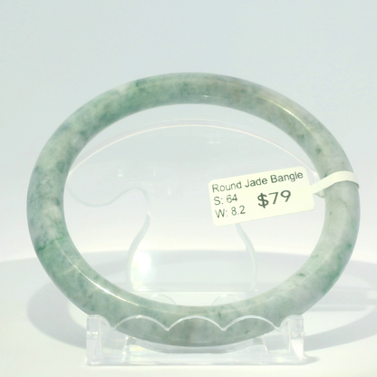 Natural Burmese jadeite bangle in white with ocean blue, 64mm inner diameter, hand-polished