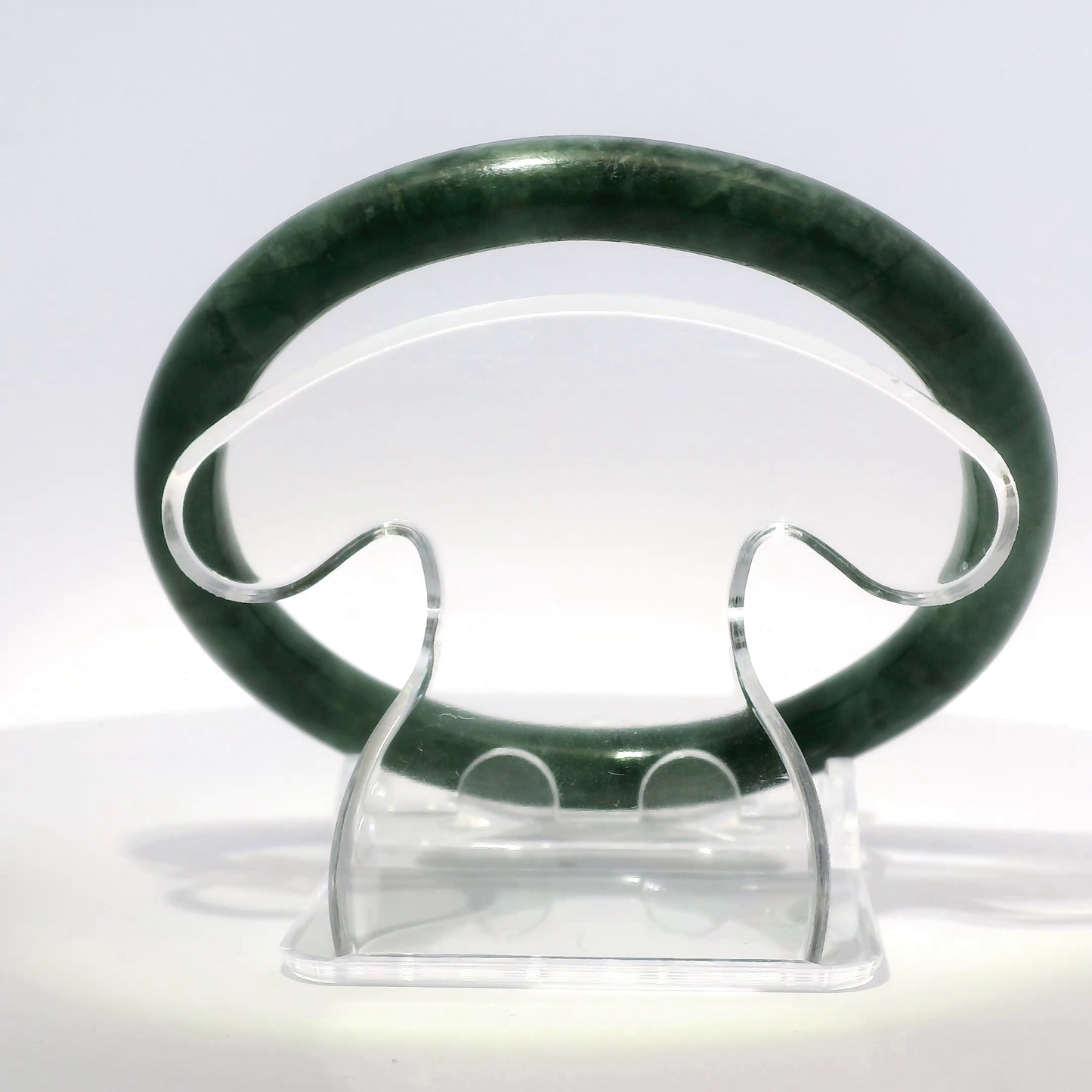 Natural Burmese Jadeite Bangle 61.3mm imperial black top view on display stand - SL431
