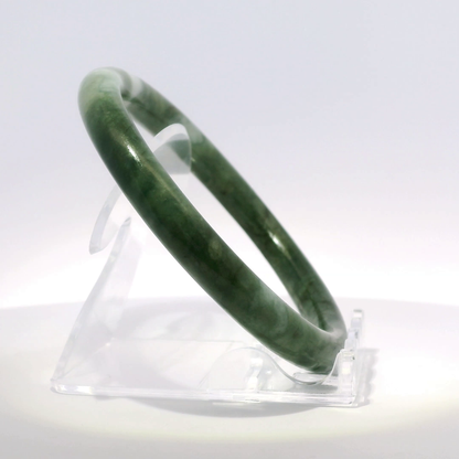 Natural Burmese Jadeite Bangle 61.4mm vintage imperial white angled side view on stand - SL432