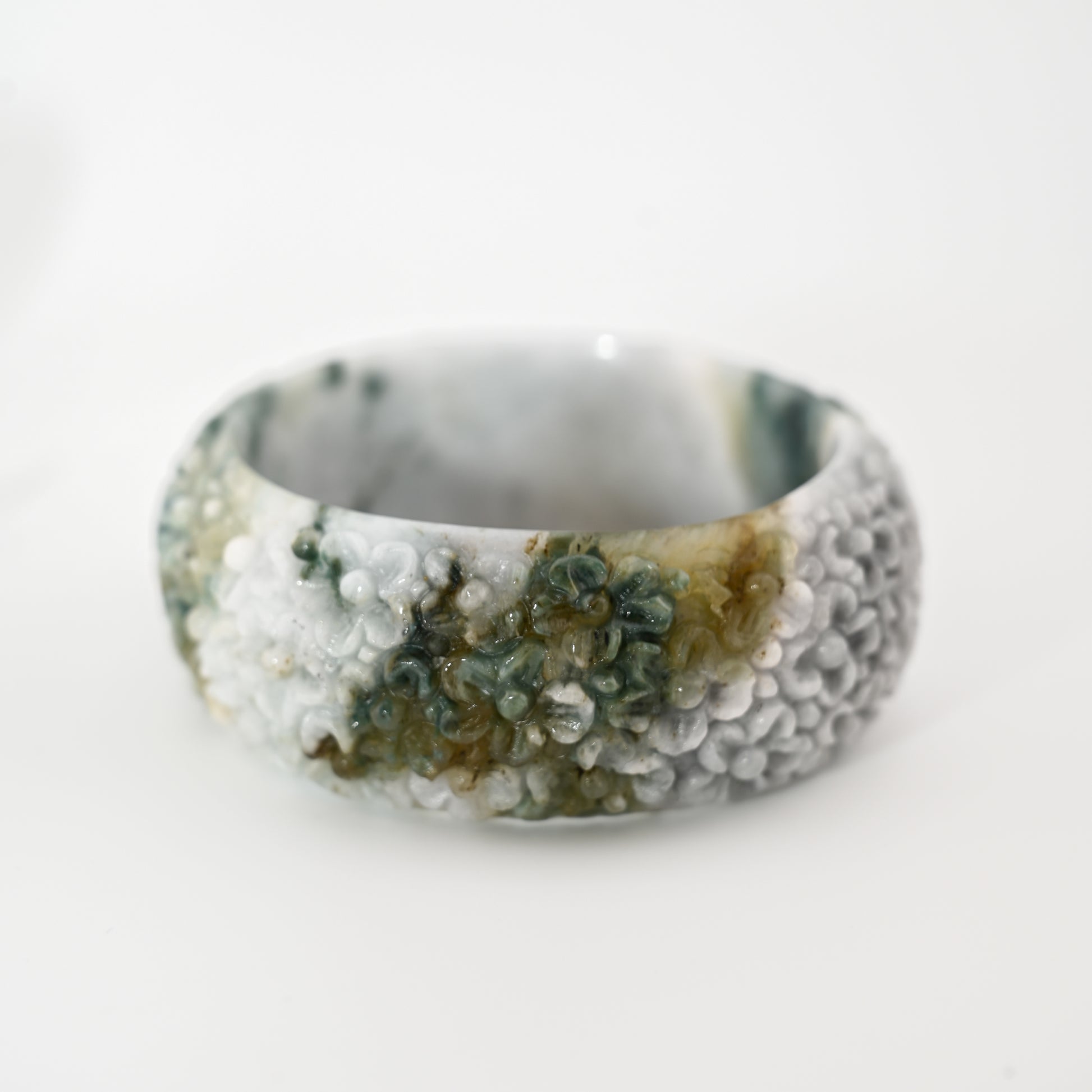 Floral-engraved Burmese jadeite bangle cuff in white, ocean blue, wuji lavender and vintage tones