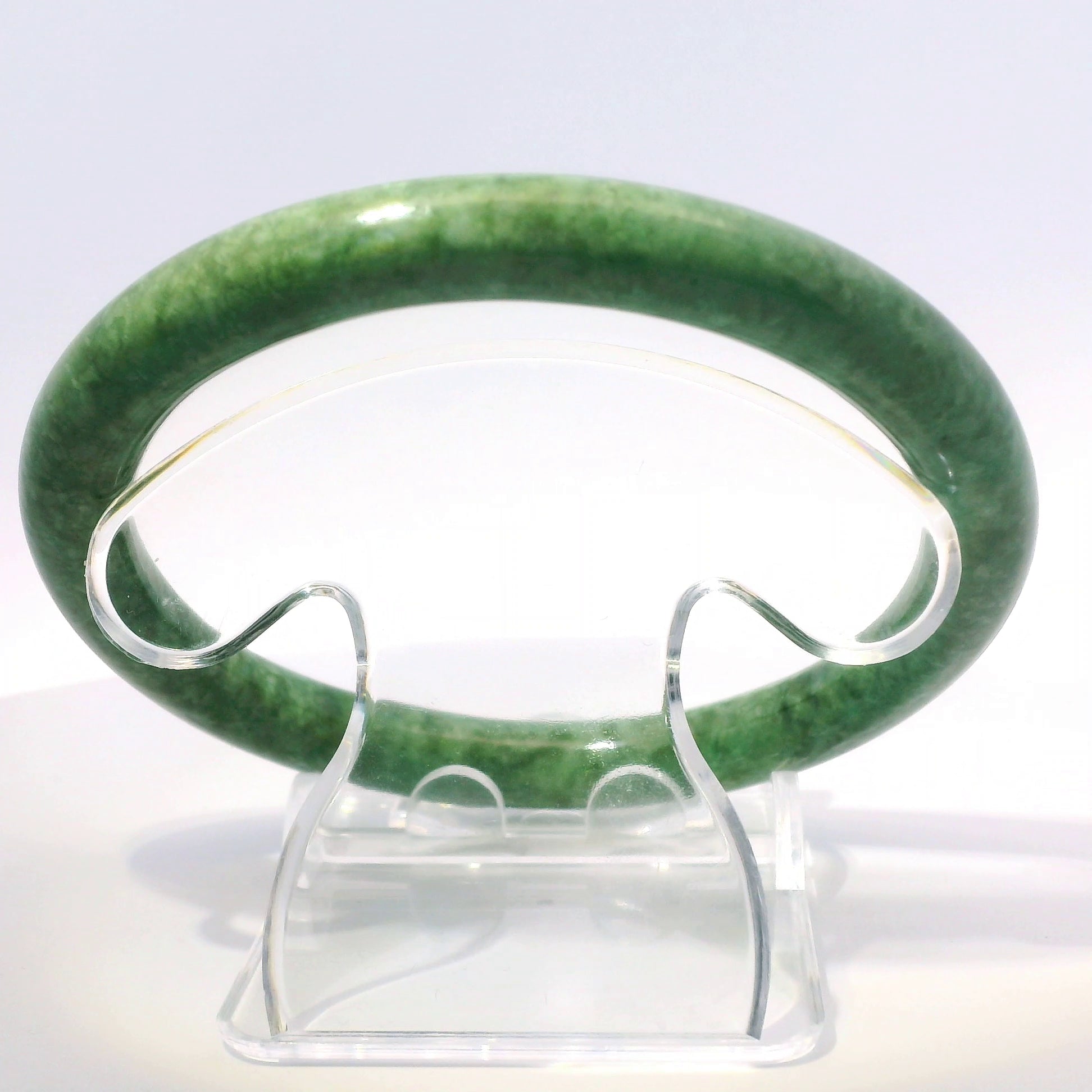 63mm Candy Apple Green Round Jade Bangle, top-down view on display stand, authentic Type A Burma jadeite, Brother Ryan Shop