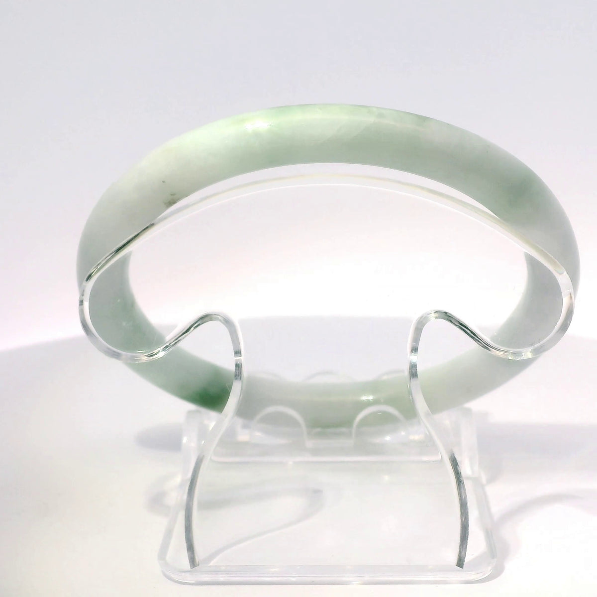 58mm Apple Mix Round Cut Bangle, top-down view on display stand, authentic Type A Burma jadeite, Brother Ryan Shop