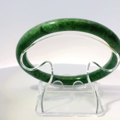 60mm Imperial Round Jade Bangle, top down view on display stand, authentic Type A Burma jadeite, Brother Ryan Shop