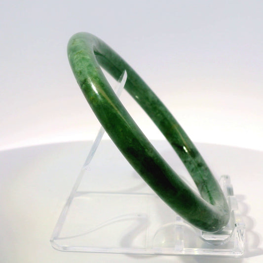 60mm Imperial Round Jade Bangle, side profile view on display stand, authentic Type A Burma jadeite, Brother Ryan Shop