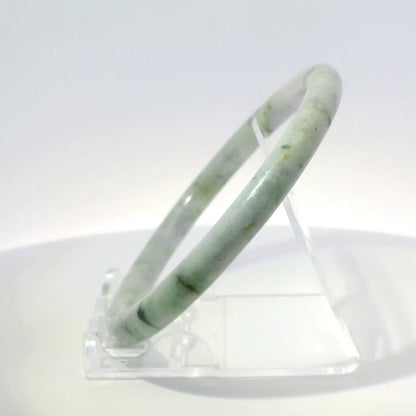 61mm Lavender Black Round Jade Bangle, angled side view on display stand, authentic Type A Burma jadeite, Brother Ryan Shop