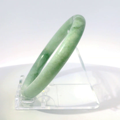 55mm Green Round Jade Bangle, top-down view on display stand, authentic Type A Burma jadeite, Brother Ryan Shop