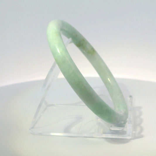 56mm Light Sakura Round Jade Bangle, front view on display stand, authentic Type A Burma jadeite, Brother Ryan Shop