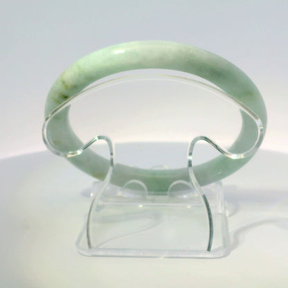 56mm Light Sakura Round Jade Bangle, top-down view on display stand, authentic Type A Burma jadeite, Brother Ryan Shop