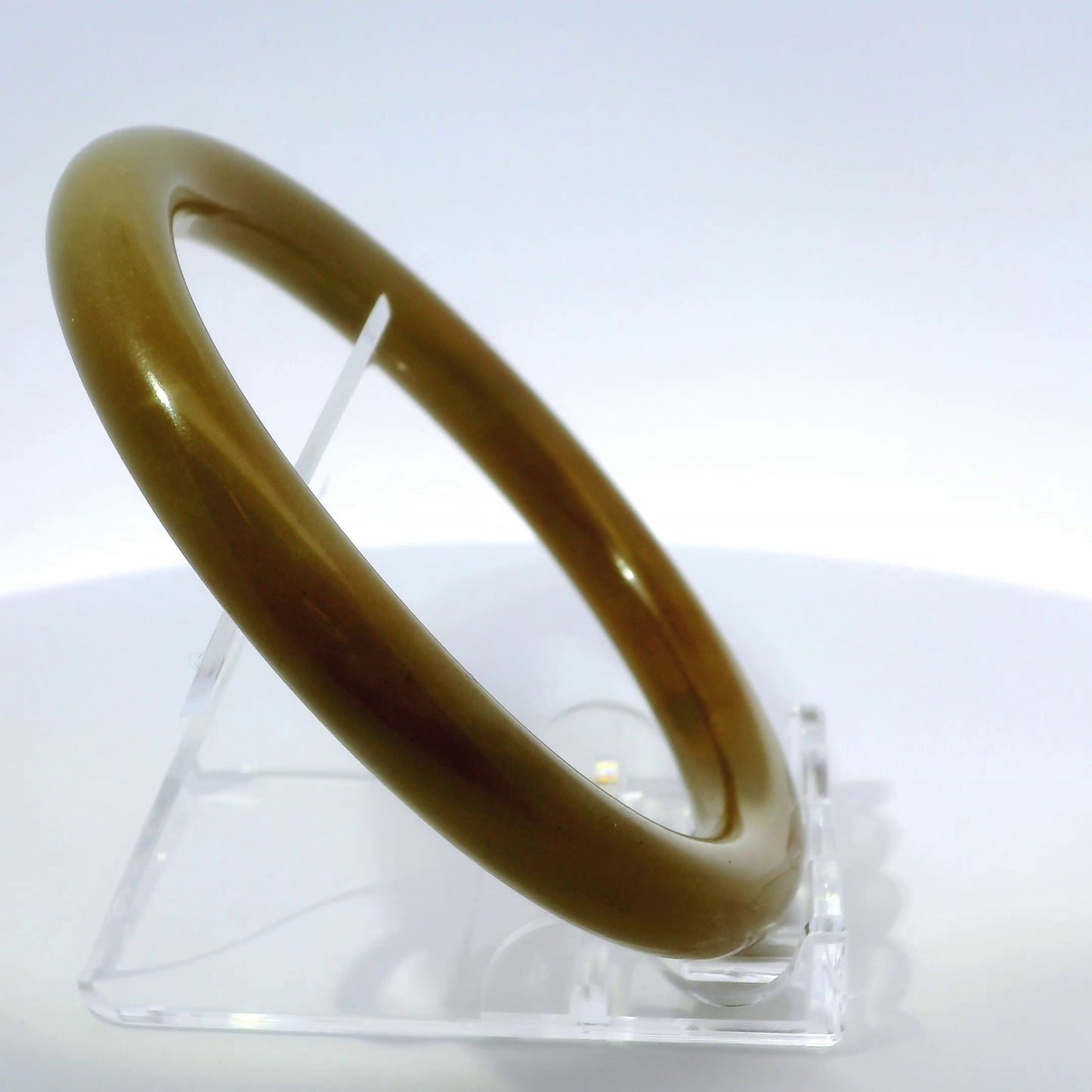 63mm Raw Honey Round jade bangle, upright edge view on display stand, authentic Type A Burma jadeite, Brother Ryan Shop