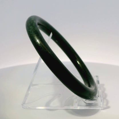 59mm Black Round Cut Jade Bangle, upright edge view on display stand, authentic Type A Burma jadeite, Brother Ryan Shop
