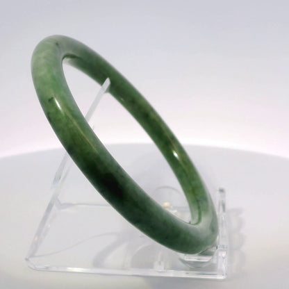 61mm O.G. Imperial Round Jade Bangle, upright edge view on display stand, authentic Type A Burma jadeite, Brother Ryan Shop