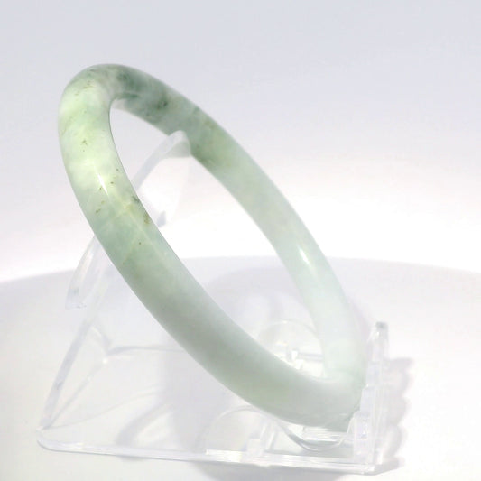 59mm White Moss Round Jade Bangle, upright edge view on display stand, authentic Type A Burma jadeite, Brother Ryan Shop