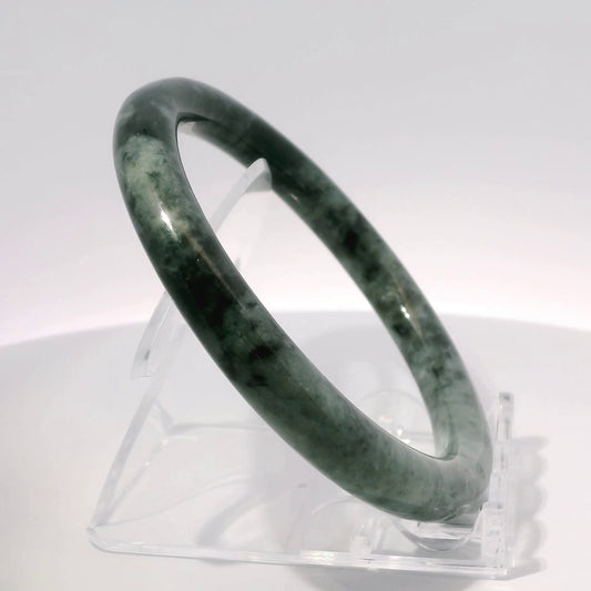 59mm Yin-Yang Round Jade Bangle, upright edge view on display stand, authentic Type A Burma jadeite, Brother Ryan Shop