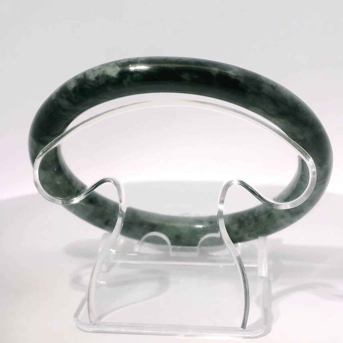 59mm Yin-Yang Round Jade Bangle, top-down view on display stand, authentic Type A Burma jadeite, Brother Ryan Shop