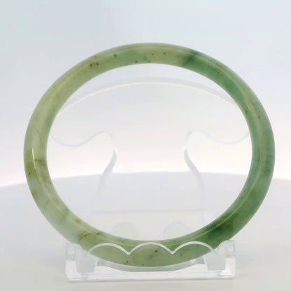 61mm Banana Leaf Round Jade Bangle, front view on display stand, authentic Type A Burma jadeite, Brother Ryan Shop