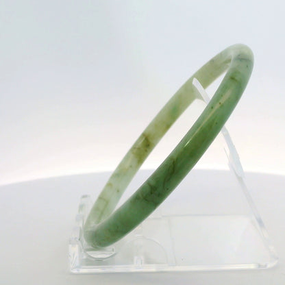 61mm Banana Leaf Round Jade Bangle, side profile view on display stand, authentic Type A Burma jadeite, Brother Ryan Shop