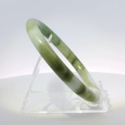 59mm White Banana Leaf Round Jade Bangle, angled side view on display stand, authentic Type A Burma jadeite, Brother Ryan Shop