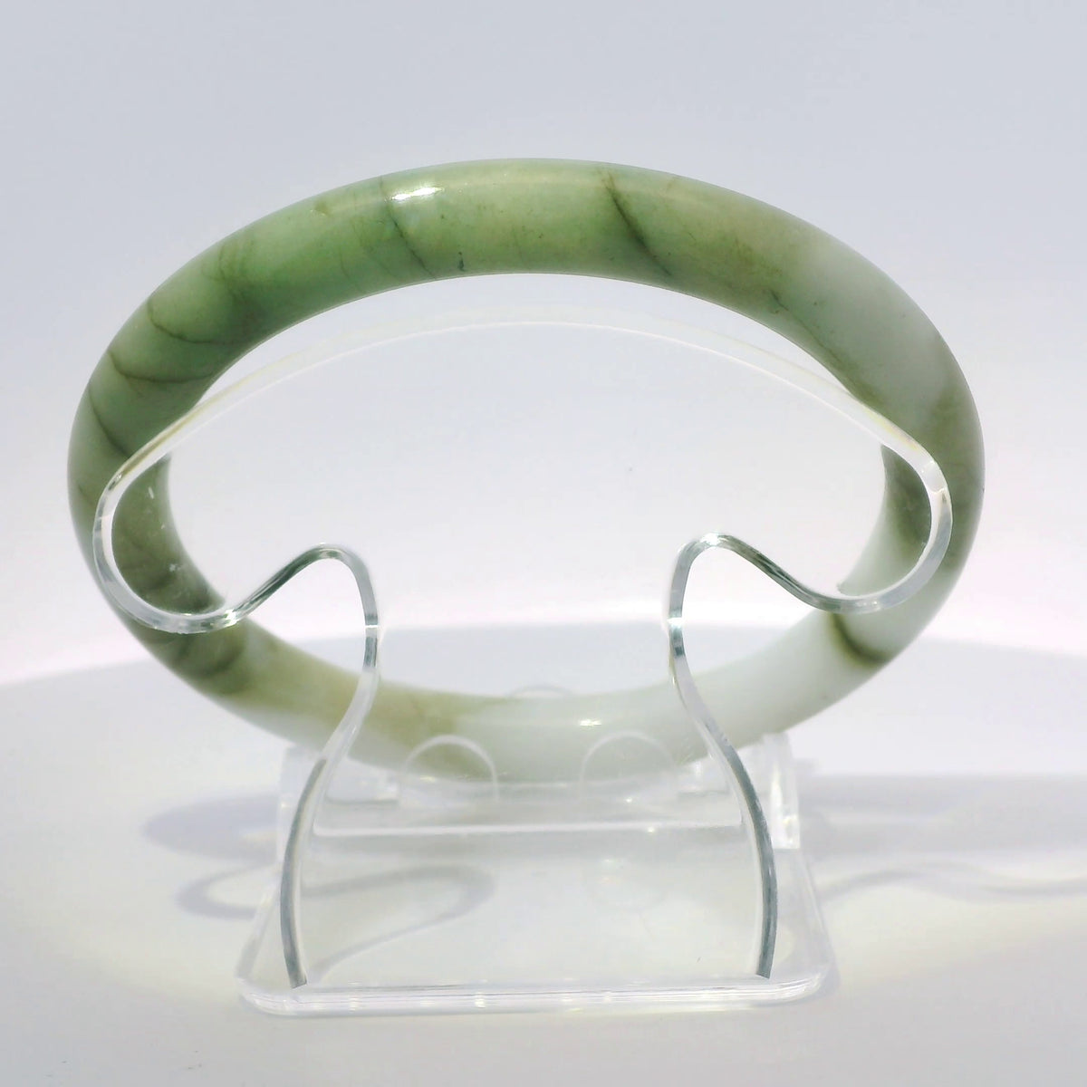 59mm White Banana Leaf Round Jade Bangle, close-up view showing stone texture and pattern, authentic Type A Burma jadeite, Brother Ryan Shop